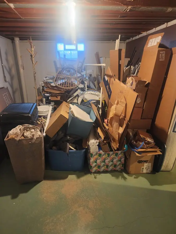 Roll-off dumpster container at job site for 8 Yard Dumpster Rental in Mobridge